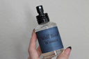 Well Read Woman book-themed body spray with blue label