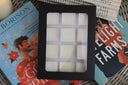 12-piece wax melt sampler box for book lovers on festive romantasy book covers and open pages