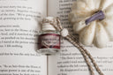 car diffuser small glass jar and wooden lid for the scent 'lorebound library'